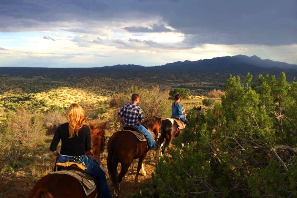 horseback riding in santa fe new mexico at sunset