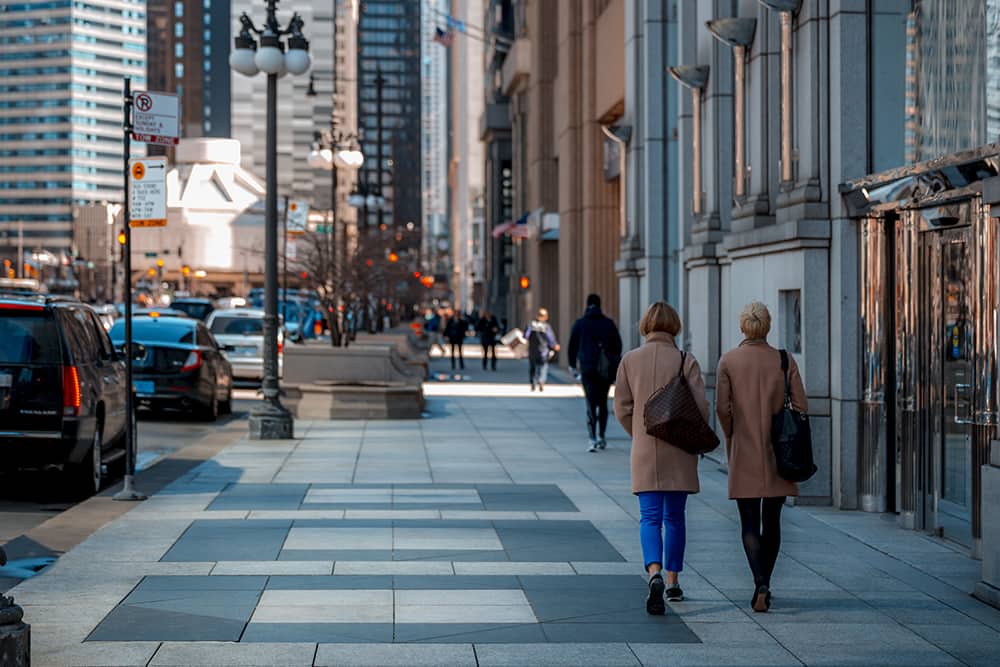 People walking down the streets near where the Taste of Chicago event is held.