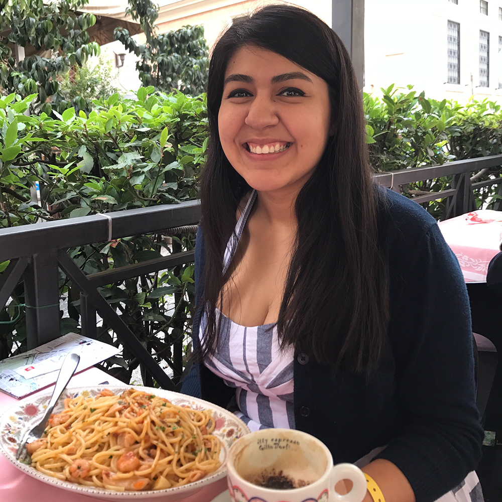 Vanessa dining in Italy