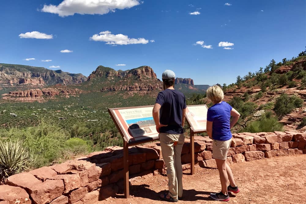 A couple looking over Airport Mesa in Sedona - Sedona is know for vortexes